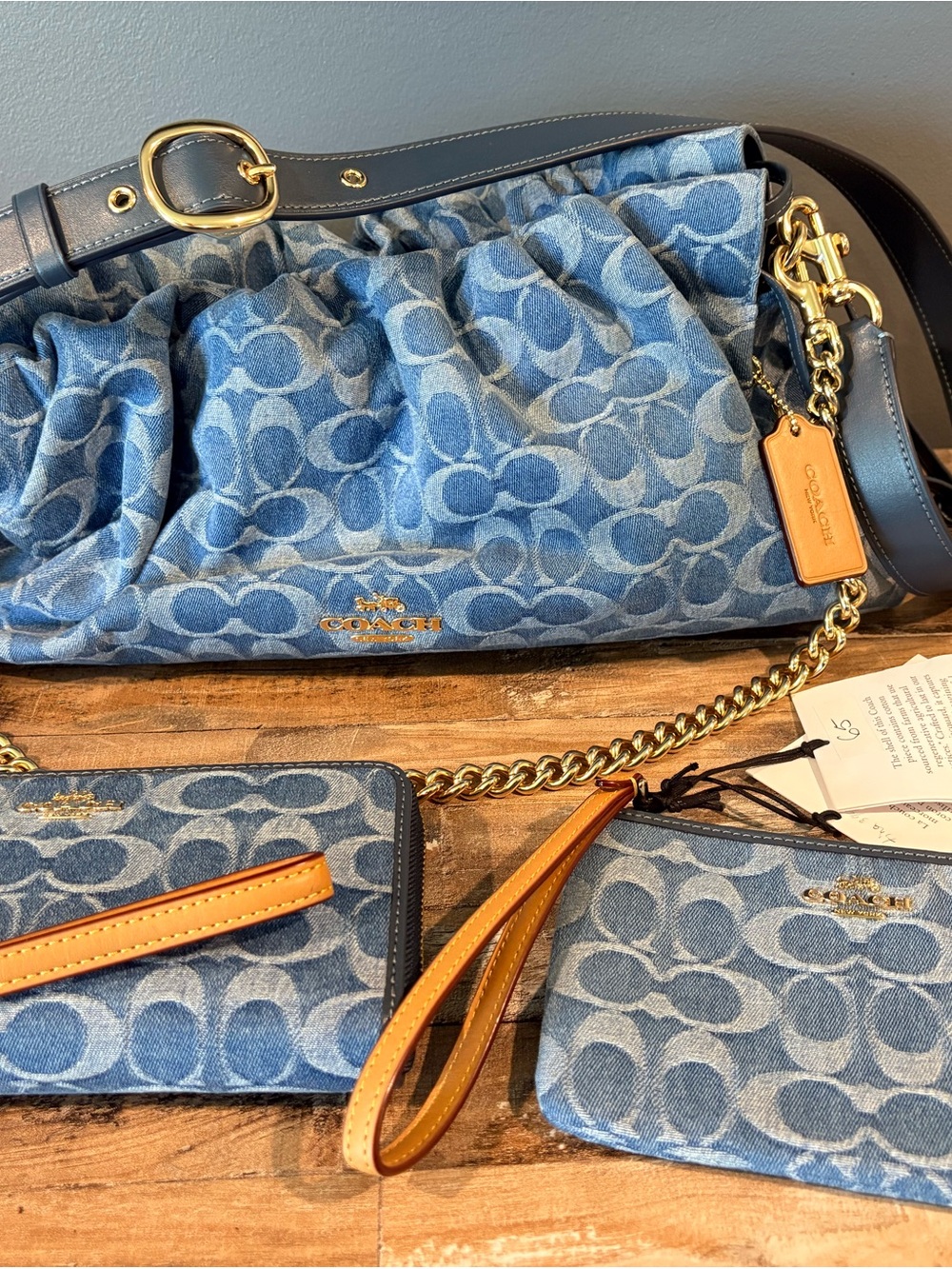 Coach Denim Signature Faye large Ruched Shoulder Bag denim with gold hardware.